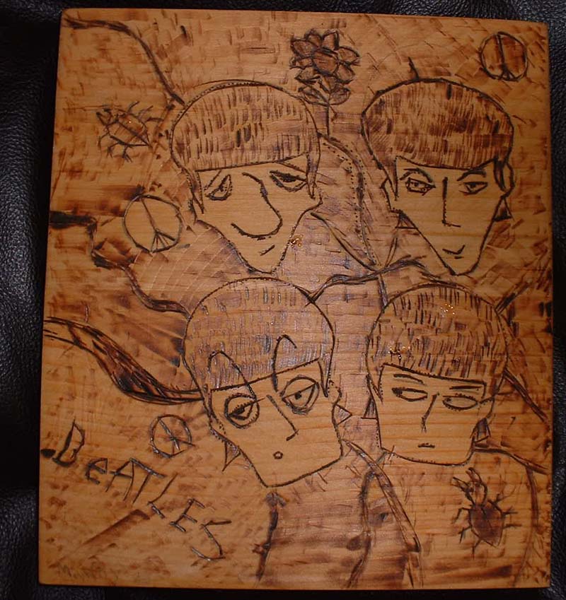 woodburned Beatles hot plate by Rockart_starr